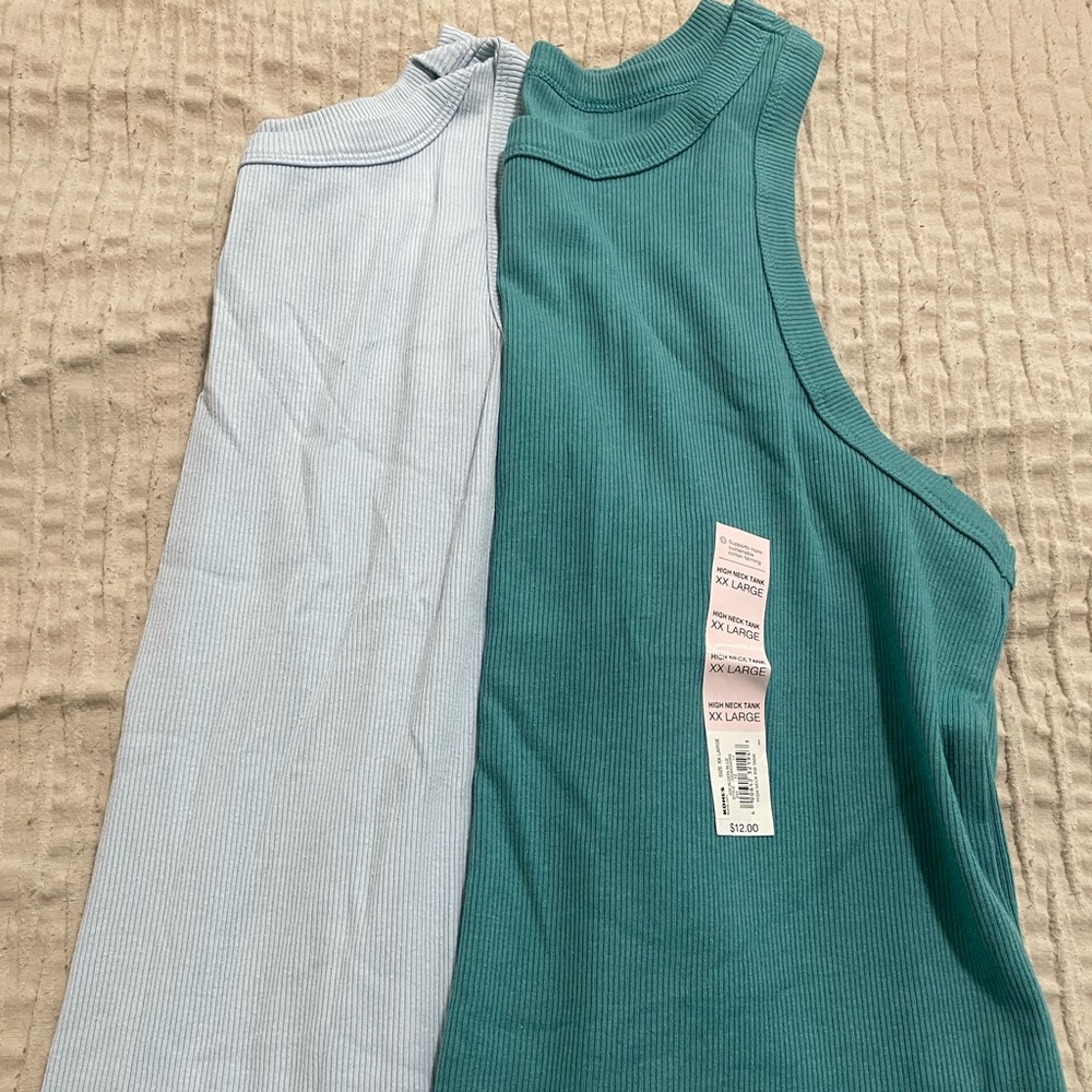 Three Junior 2XL tanks from Kohls. 1 NWT